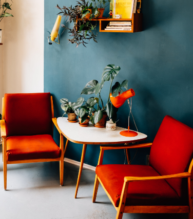 two-red-chairs-near-white-table (1)